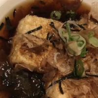 Agedashi Tofu · The deep fried tofu served in house special dashi sauce with bonito flake, green onion and k...