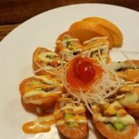 Orange Blossom (8pcs) · In: spicy salmon and avocado, out: fresh salmon, sauce: spicy mayo and wasabi mayo sauce.