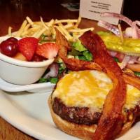 Bacon Cheese Burger · 1/2 lb. USDA Choice ground chuck cooked to your liking. Served with bacon, melted cheddar-ja...
