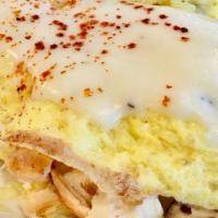 Alfredo Omelet · Grilled 8 oz. chicken breast, onions, sliced mushrooms and Parmesan cheese, topped with crea...