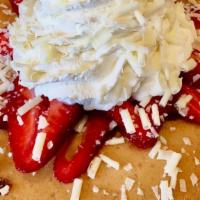 Strawberry and White Chocolate · Plain pancakes topped with fresh sliced strawberries, white chocolate shavings and whipped c...
