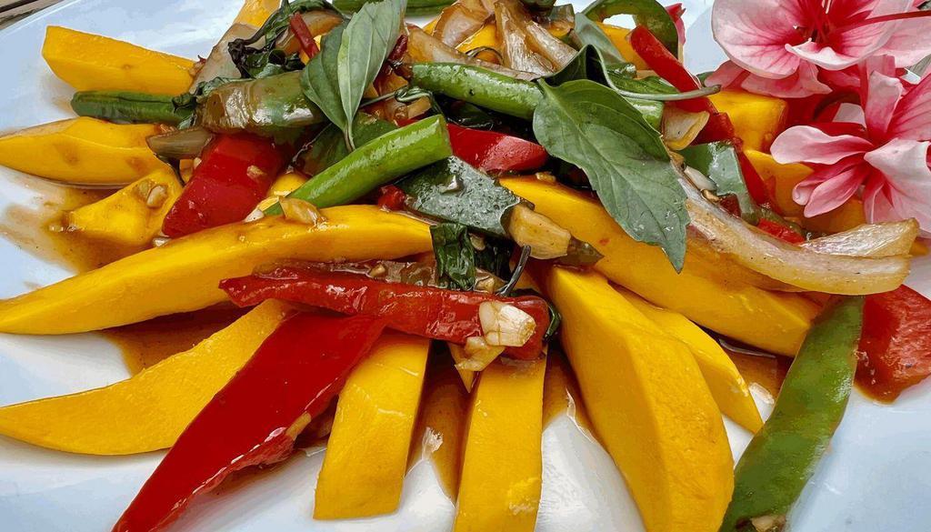 Basil Mango* · Thai feast dishes of sweet and perfume mangoes and spicy basil with your choice of protein.
