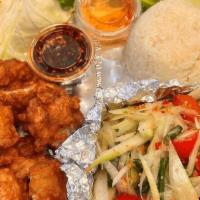 Gai Tod Som Tum · Papaya salad w/ fried chicken and sticky rice.
