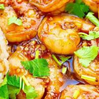 Garlic Prawns · Stir fried with garlic sauce and served with jasmine rice.