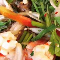Yum Talay (Seafood Salad)* · Shrimps, calamari, mussels with tomato, white & green onion, celery, cilantro mixed in house...