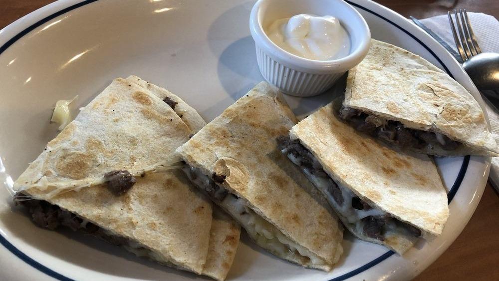 Quesadillas Chica · Your choice of meat, steak, chicken, carnitas, pastor, grilled flour tortillas with cheese.served with sour cream.