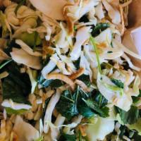 Bungalow Salad (DD) · cabbage, mint, cilantro & fried shallots. Choice of tamari-ginger dressing or fish sauce dre...
