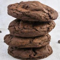 Triple Choc Cookie · Soft, giant chocolate cookie filled with a medley of melty pools of dark chocolate chunks an...