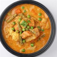 Vegetable Korma · Mixed vegetables cooked in creamy sauce.