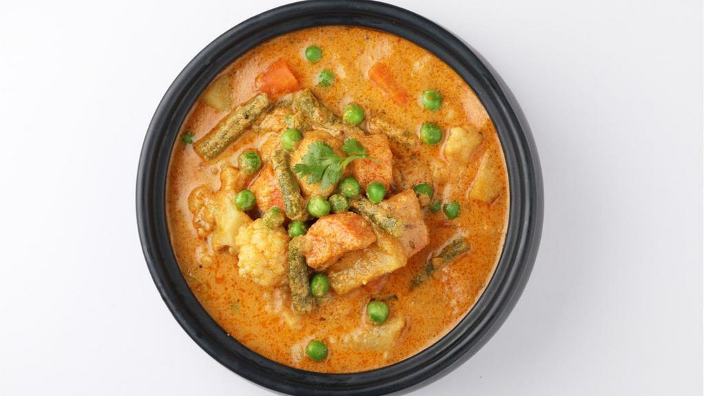 Vegetable Korma · Mixed vegetables cooked in creamy sauce.