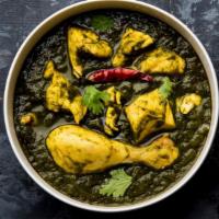 Chicken Saag · Chicken cooked in spinach sauce with indian spices.