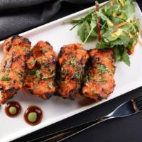 Tandoori Mint · Chicken breast marinated with mint paste & indian spices & cooked in clay oven.