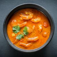 Seafood Curry · Prawn & fish cooked with sauteed onions, garlic, ginger and indian curry sauce.