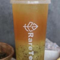 Kiwi Delight · Jasmine green tea  with fresh orange and lemon juice topped off with organic kiwi pulp