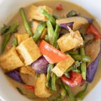 Tofu Green Curry* (GF)      · Tofu with Thai basil, eggplant, green bean and
bell pepper in green curry sauce.