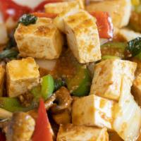 Pad Graprow Tofu - Basil Tofu · Tofu sauteed with fresh basil leaves, mushroom, onion, bell pepper and spicy garlic sauce.