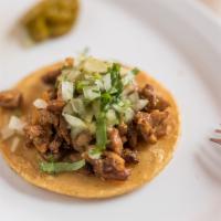 Steak Taco · With onion, cilantro and salsa.