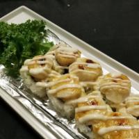 Baked Scallop Roll · [Crab . Avocado] Scallop baked with creamy sauce topped with Scallion and Tobiko.
