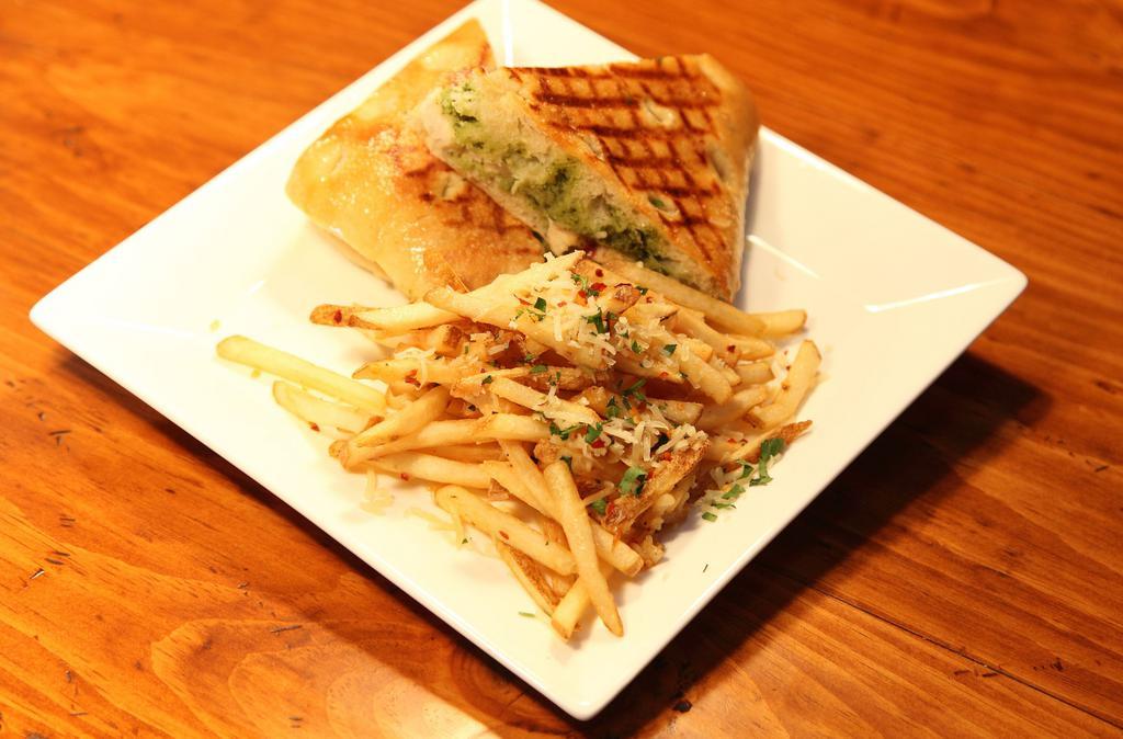 The Tuscan · Grilled chicken, roasted red peppers, fontina cheese, and pesto served on grilled foccaccia.