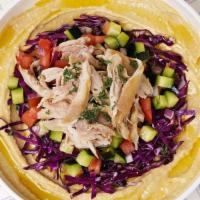 Roasted Chicken Hummus Bowl · Original hummus drizzled in olive oil and spices served with roasted chicken, cucumber tomat...