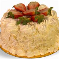 *Strawberry Shortcake · Vanilla cake filled with fresh strawberries and whipped cream, iced with whipped cream (We c...