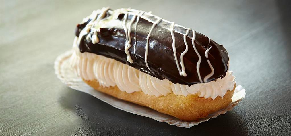 Éclair · Pâte à Choux half dipped in chocolate ganache filled with whipped cream