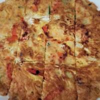 25. Hae Mul Pa Jeon · Pan-fried Cake w/Seafood and Vege.