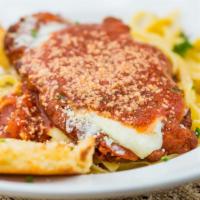 Chicken Parmesan · On linguine, served with cheesy garlic bread.