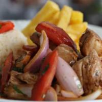 Pollo Saltado (same as lomo saltado but with chicken) · Tender chicken in a simple and savory marinade. (Served with french fries and jasmine rice)
