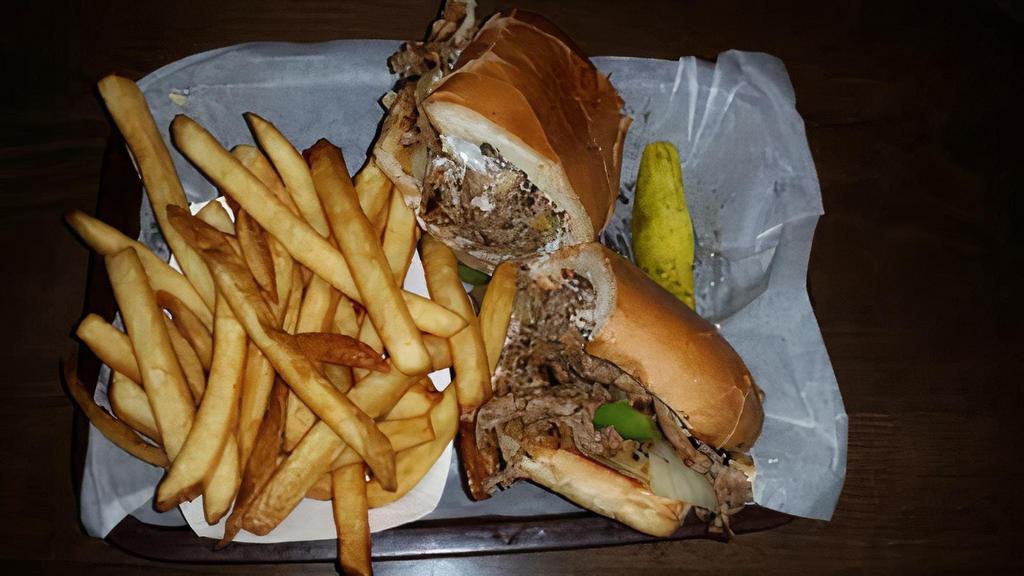 Philly Cheesesteak · Sliced Sirloin, White American Cheese, Grilled Onions and Bell Peppers  on a French Roll. Served with Fries or Mini Salad.