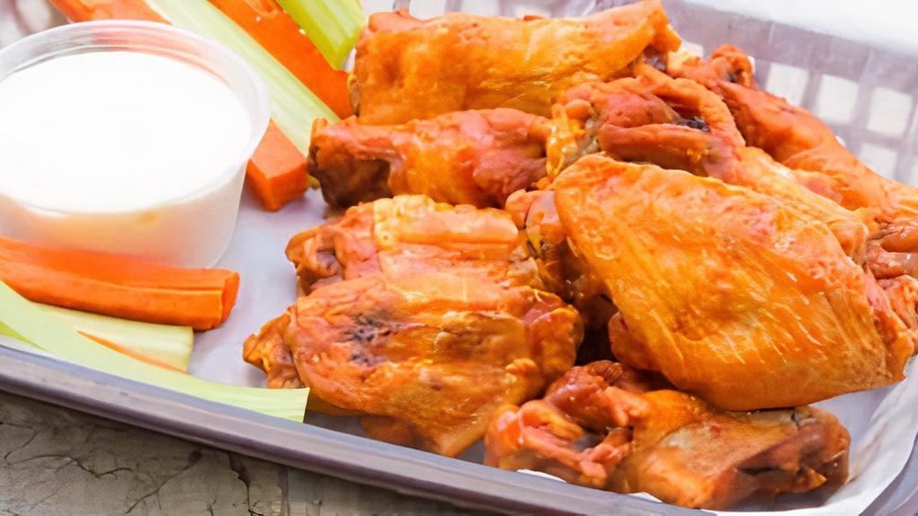 Classic Bone In Wings (10) · Ten Traditional Wings tossed in our Signature Sauces with Carrots, Celery and One Dipping Sauce.
