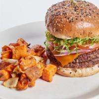 Vegan Double Cheeseburger, V · house-made with portobello, walnut, beet, lettuce, pickled onion, organic tomato, vegan ched...