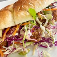 Spicy Schezwan Fried Chicken Sando · Marinated all-natural chicken thighs, house-made tangy Schezwan slaw (carrots, celery, shred...