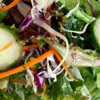 House Salad · Organic Mixed Greens, Romaine, Kale, Carrots, Tomatoes, Cucumbers w/ House Vinaigrette.