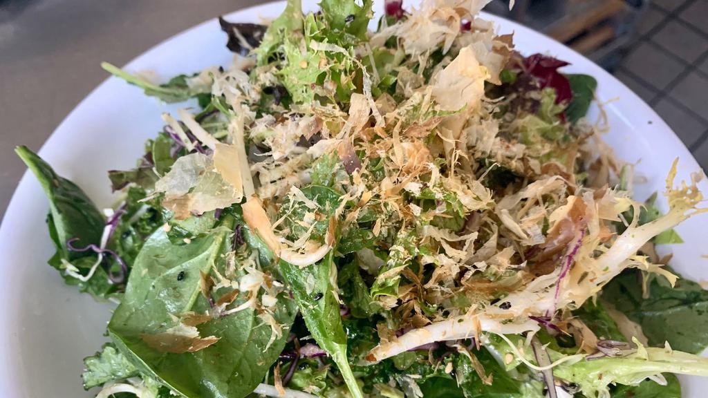 Furikake Salad · Organic romaine, kale, mixed greens, and mung bean sprouts tossed with house-made furikake (toasted sesame seeds, seaweed, bonito flakes) and a light, soy black sesame dashi dressing.