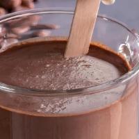 Hot Chocolate (12 oz) · French Valrhona Chocolate, Steamed Milk. Topped w/ Heavy Cream.