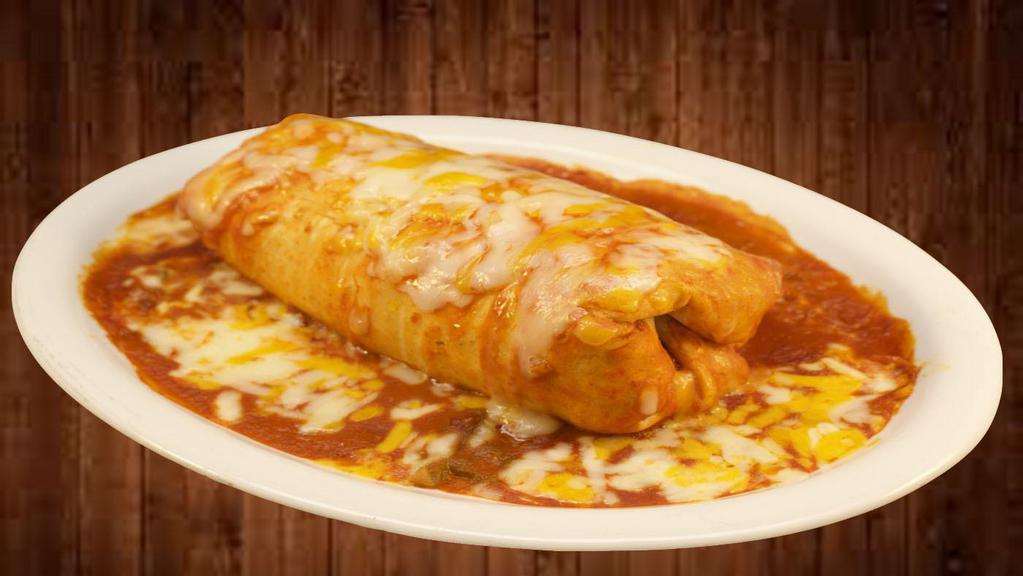 Super Enchilada · Choice of meat, rice, beans, vegetables rapped up in a burrito top with a mild red sauce and cheese.