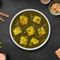 Saag Paneer · Cubes of fresh cottage cheese cooked in a spinach gravy infused with garlic, ginger, and spi...