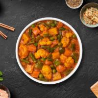 Vegetable Korma · Mixed vegetables cooked in delicate fresh spices, tomatoes and onions