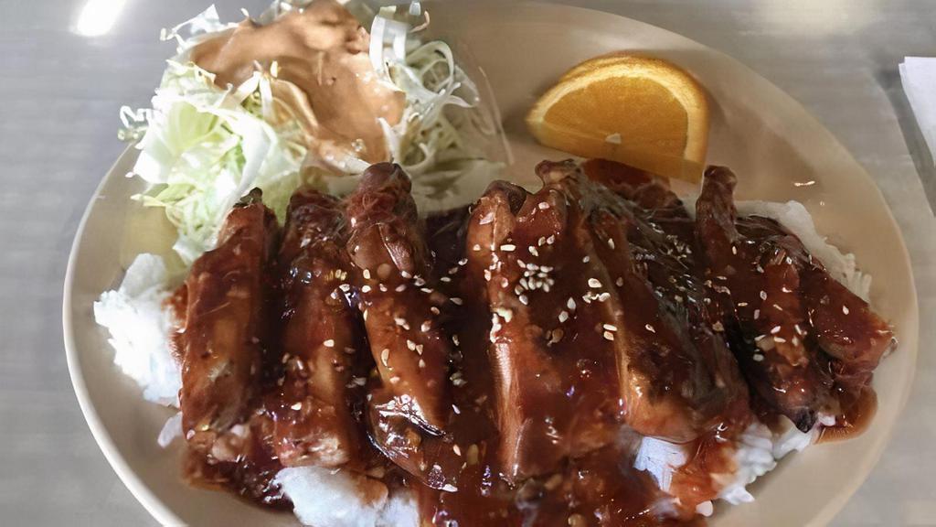 Chicken Teriyaki · With steamed rice and salad.