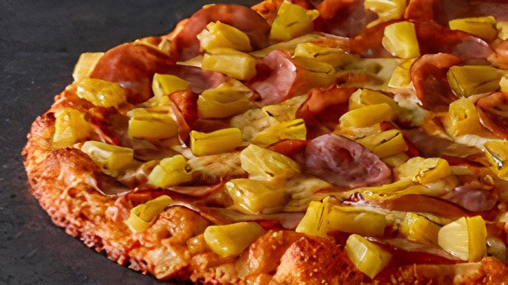Hawaiian · Island style pizza tender ham & juicy pineapple on zesty red sauce.