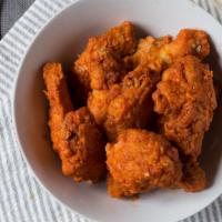 Buffalo Wings (10pc) · Served with blue cheese or ranch.