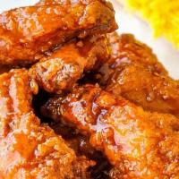 Honey BBQ Wings (10pc) · Served with blue cheese or ranch.