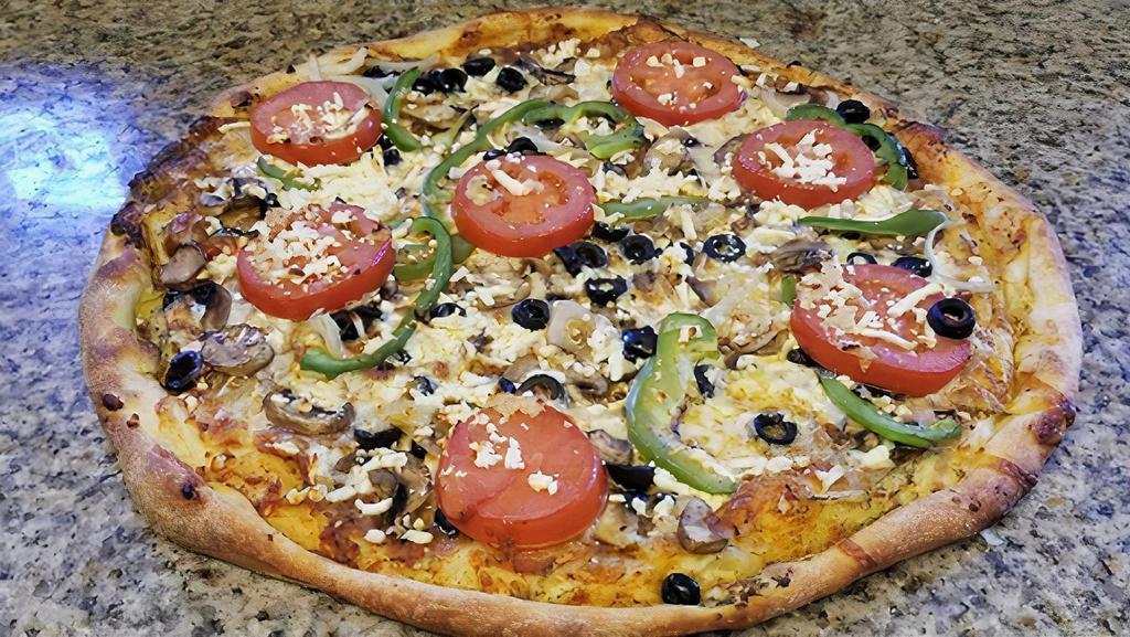 #21. Farmers Delight · Tomatoes, mushrooms, bell peppers red onions, olives, feta cheese, garlic and very lite cheese.