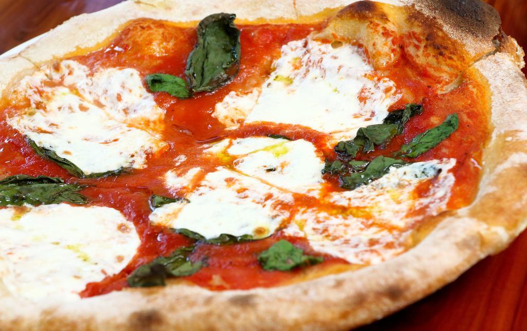 Margherita Pizza · Fior di latte mozzarella, San Marzano tomatoes, and basil.
