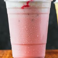 Falooda Milkshake · Dessert Disguised as a drink. Mix of rose Syrup, noodles, vermicelli, and basil seed with Mi...