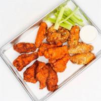 Jumbo Wings (15-pc Large Pack) · 15 crisp fried golden-brown wings tossed in sauce of your choice