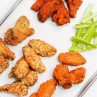 Boneless Wings (20-pc Party Pack) · 20 boneless chicken wings tossed in your choice of sauce