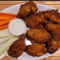 Wings · Chicken wings served with dipping sauce.