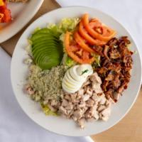 Cobb Salad · Topped with avocado, turkey, bacon, tomatoes, bleu cheese  crumbles, and a hard-boiled egg.